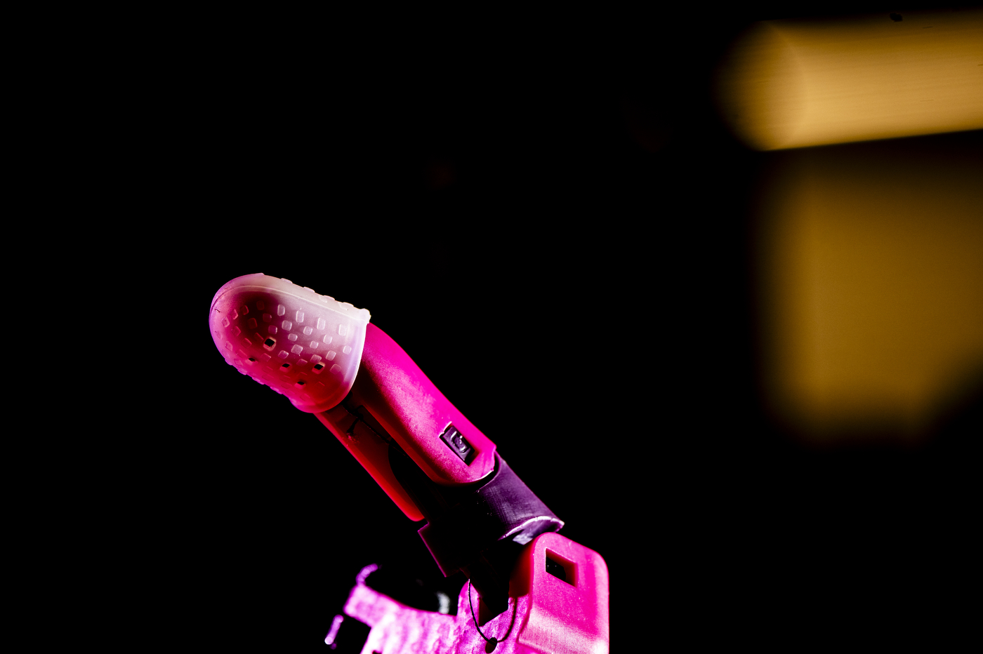 A pink prosthetic finger.