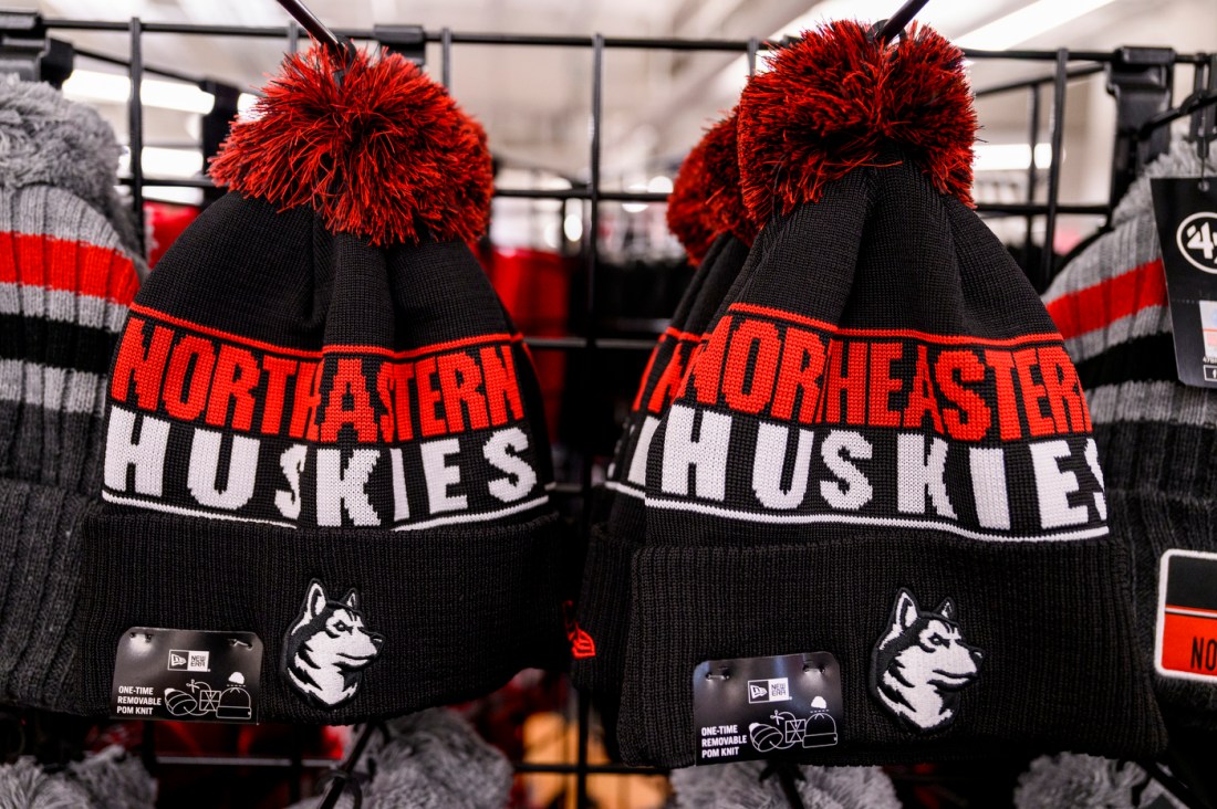 Winter pom-pom beanies with Northeastern Huskies woven into the design. They have huskies on the front.