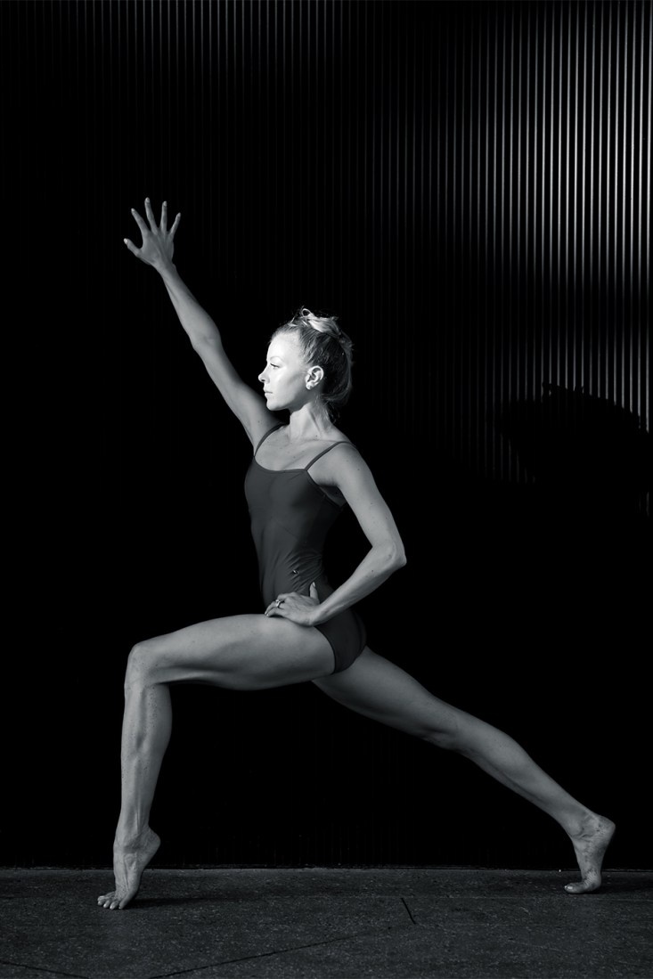 Dawn Atkins posing in a ballet lunge-style position. 