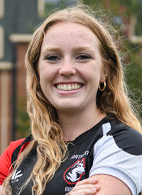 Headshot of Keira O'Connor outside in their Rugby uniform.