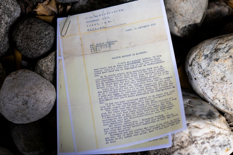 Photocopy of a letter from Andie Weiner's relatives resting on some rocks.