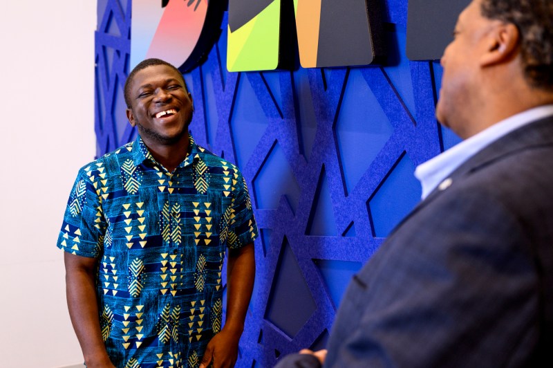 Moses Ayirebi and Richard L. O'Bryant laughing together.