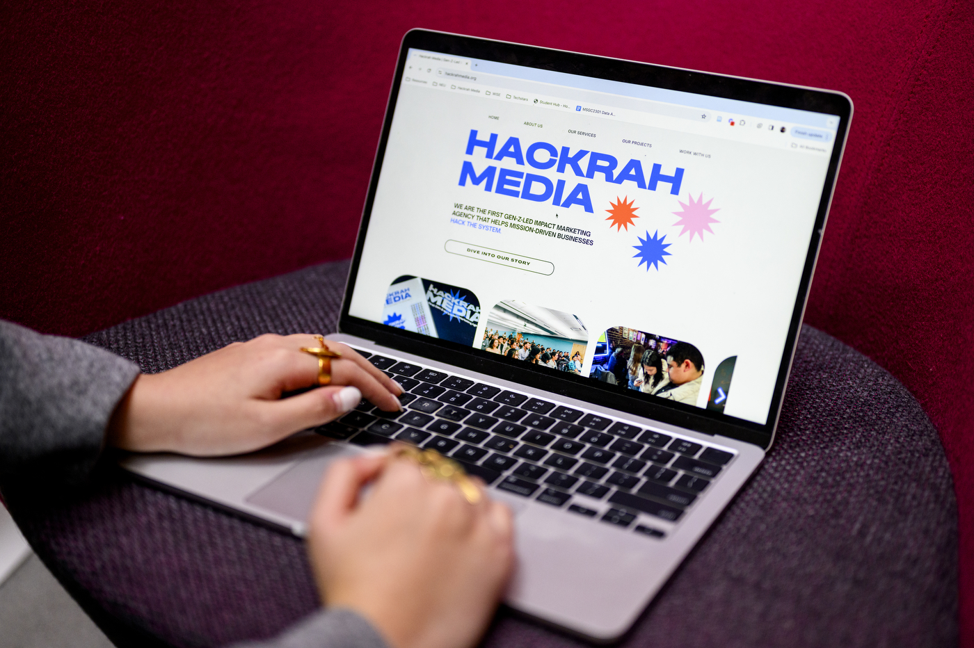 Shirley Wang views the Hackrah Media website on her laptop.