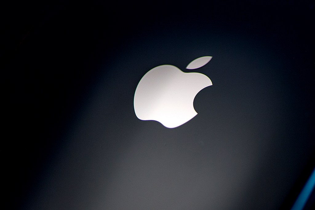 Apple's logo on a black background.