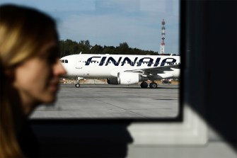 Finnair plane on the tarmac in Poland.