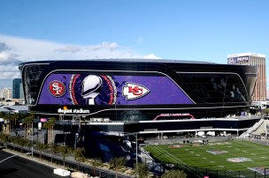 Allegiant Stadium with a display of the Kansas City Chiefs logo and the San Francisco 49ers logo.