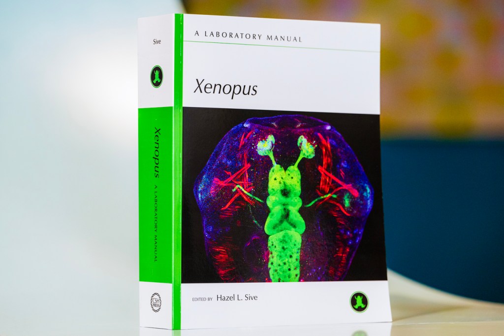The cover of "Xenopus: A Laboratory Manual," featuring a colorful picture of frog biology.