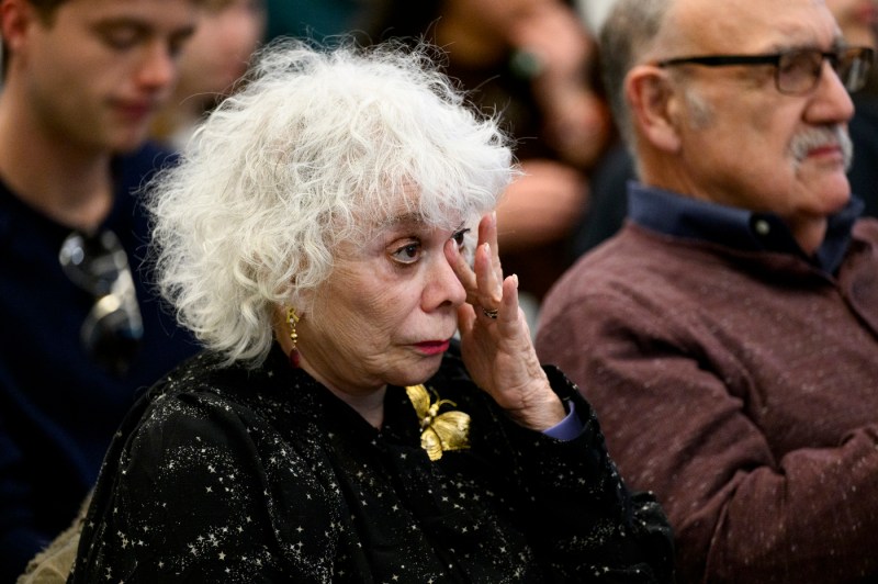 Audience members attend a Holocaust and Genocide Awareness Week event.