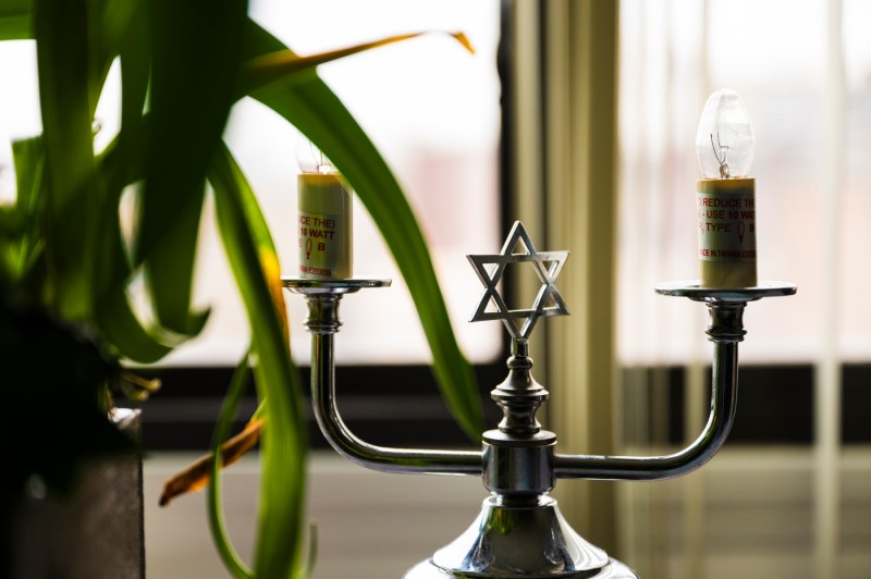 A menorah on the windowsill in Gabrielle Bailey's room at Hebrew Senior Life. 
