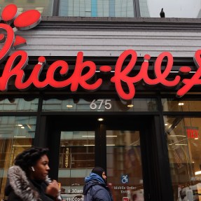 Exterior of a Chick-fil-A restaurant with the logo on the outside.