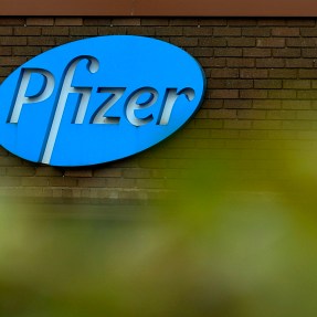 Pfizer logo on the outside of a Pfizer building.