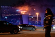 The Crocus City Hall burning in Moscow after a terrorist attack.
