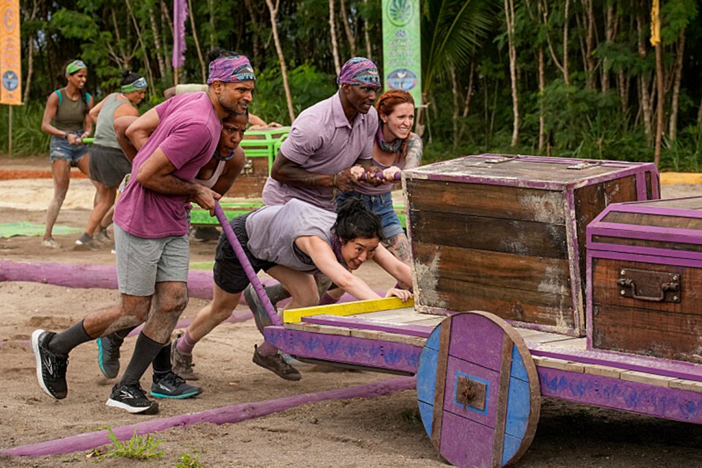 A tribe wearing purple struggles with a challenge.