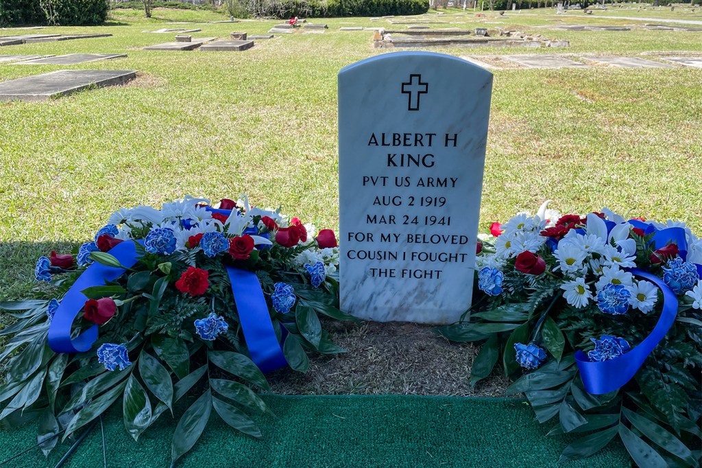 Albert King's white marble military gravestone.