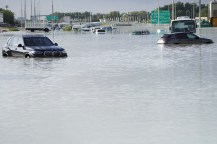 Several cars submerged in water from the flooding in Dubai.