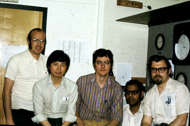 A photograph of Bob Lowndes with four other people in Dana Hall in 1972.