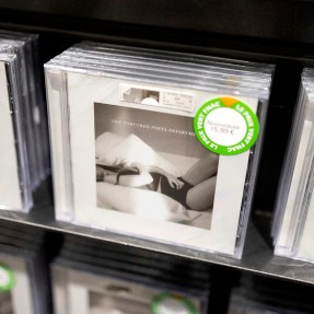 Stacks of Taylor Swift's latest album on store shelves.