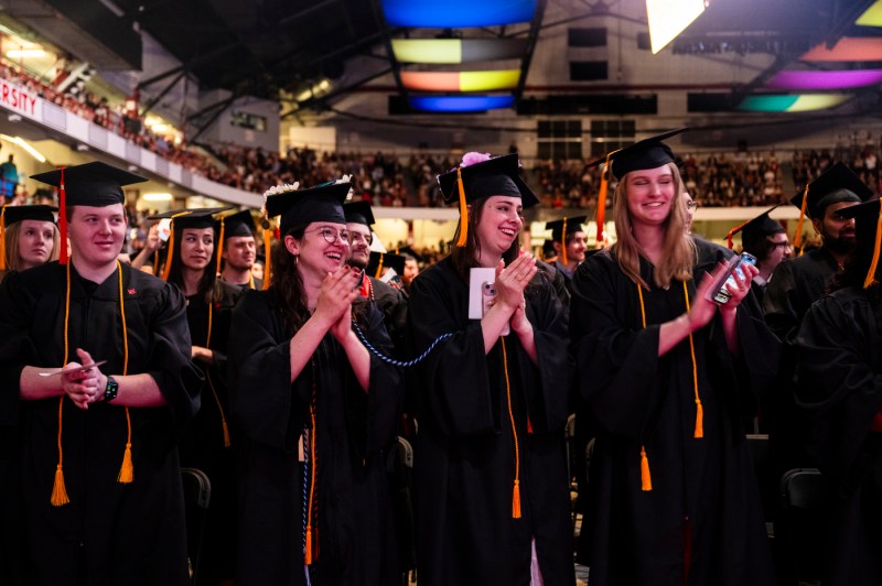 College of Science students clapping at the graduation ceremony.