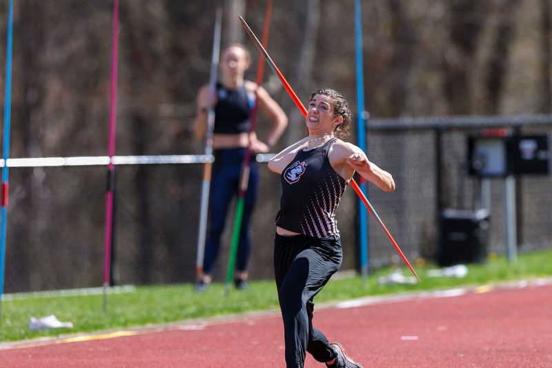 Dominique Biron throwing a javelin.
