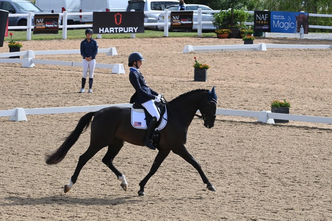 Fiona Howard riding dressage on her horse.