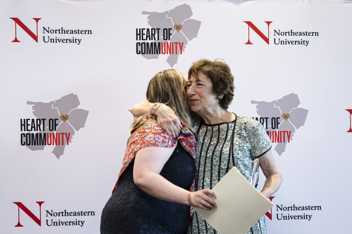 Dolores Boogdanian hugs Sharon Durkan at the CommUNITY Awards 2024.
