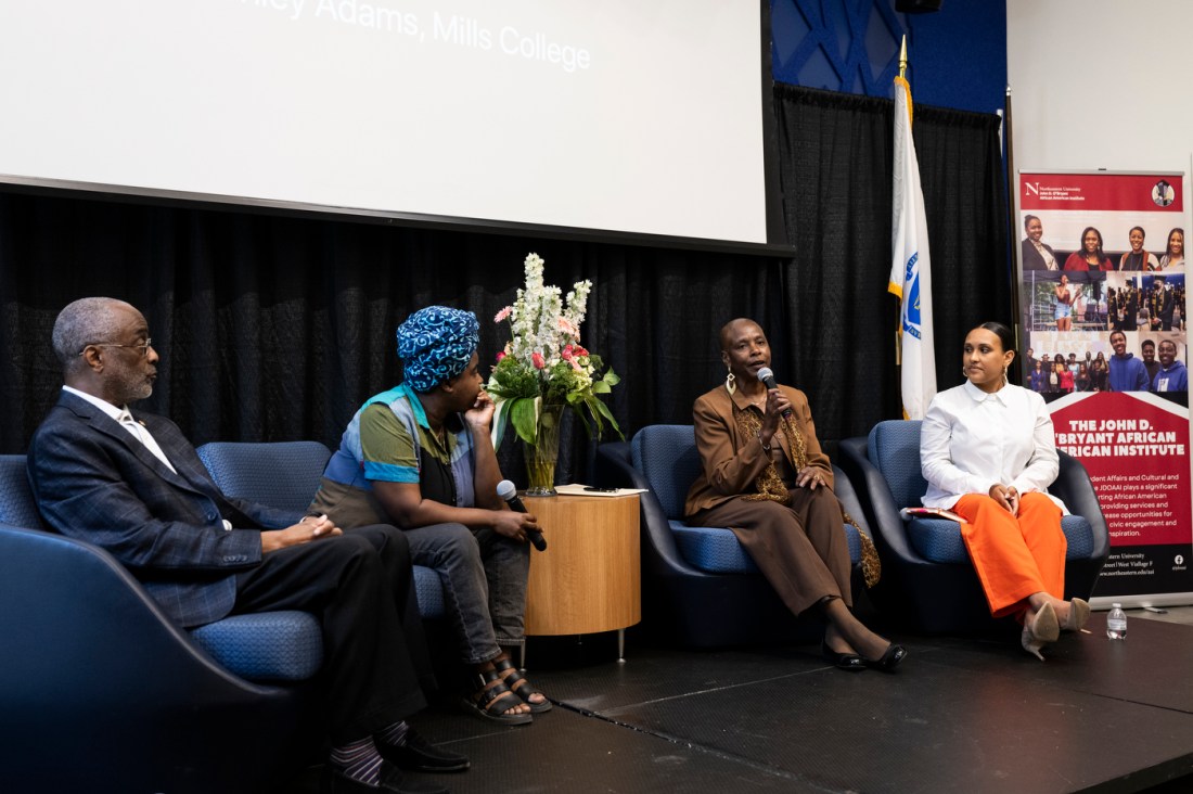 Four panelists speaking at Northeastern's 2024 Juneteenth Celebration.