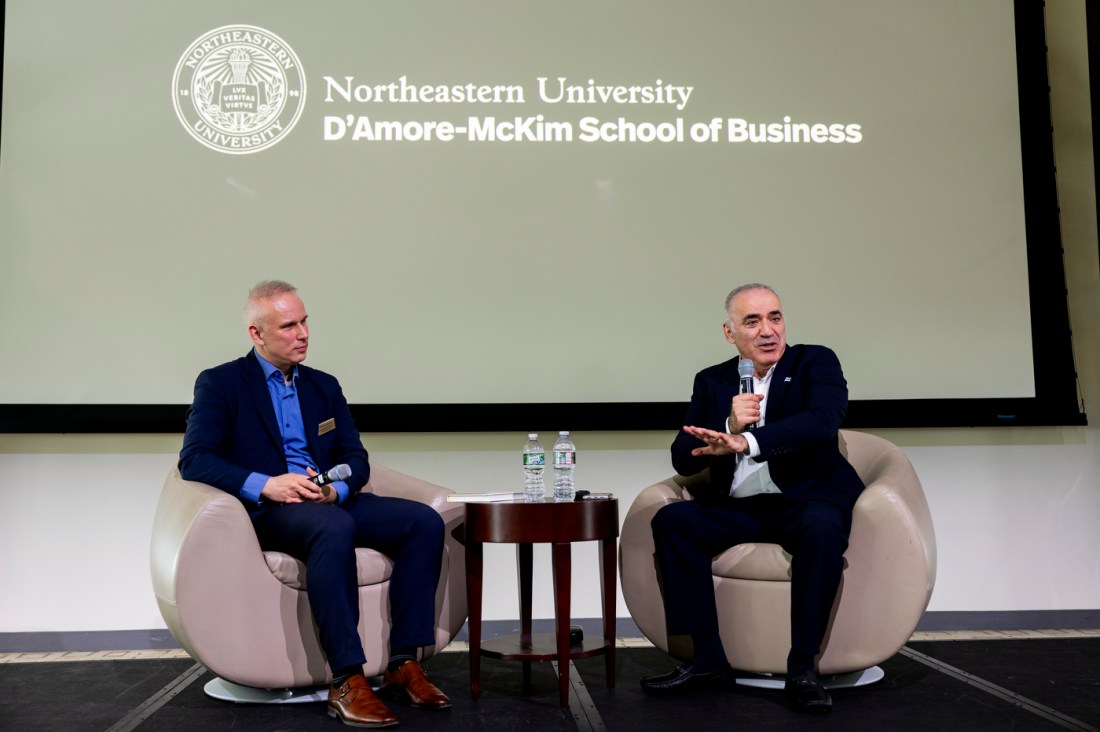 Garry Kasparov and David de Cremer speaking at a fireside chat.