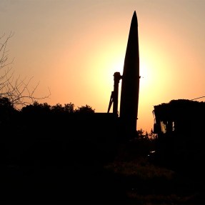 The silhouette of a Russian missile at sunset.