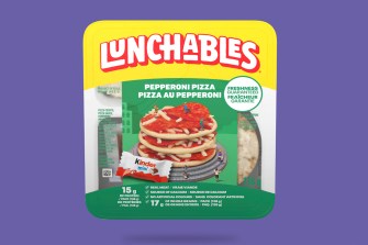 A pack of lunchables on a purple background.