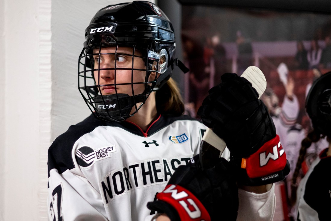 Megan Carter waiting in the tunnel before the hockey East Championship game.