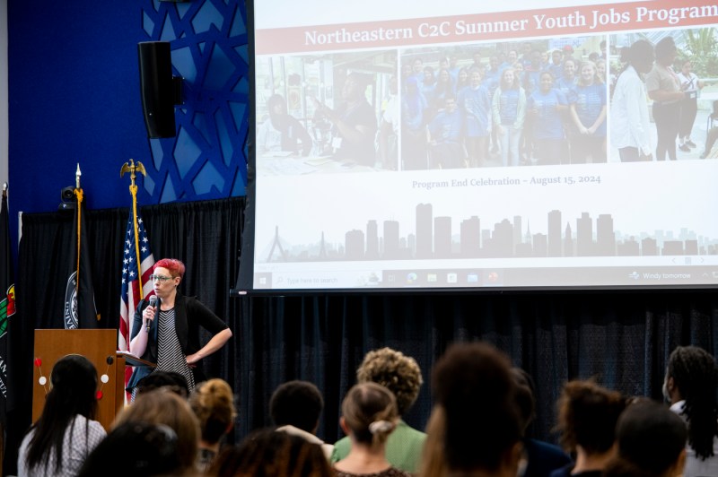 Youth interns presenting at the John D. O'Bryant Institute.