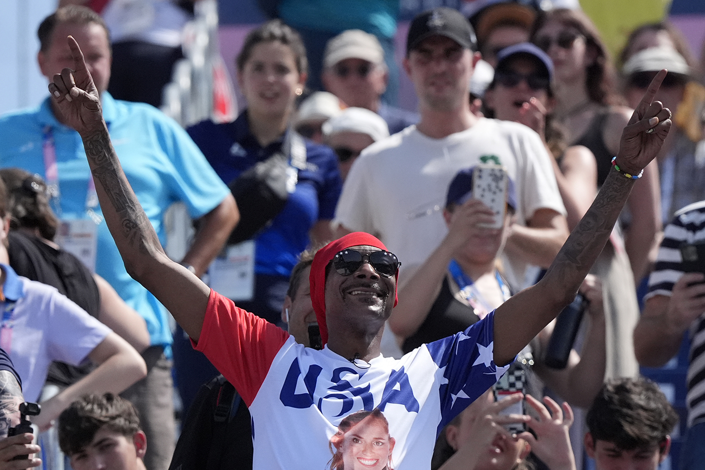 Why is Snoop Dogg at the Olympics?