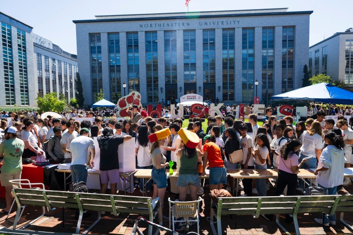 A crowd of students on the Boston campus at Fall Fest.