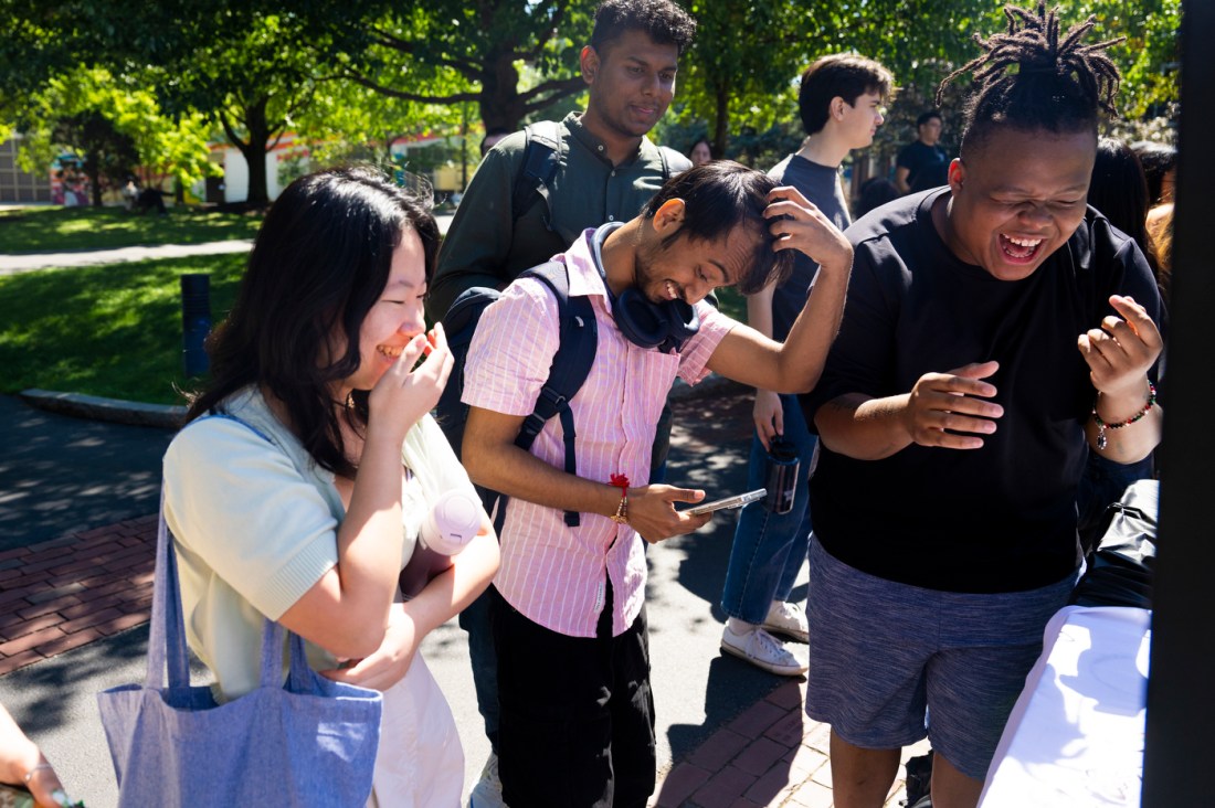 A group of students laughing together.