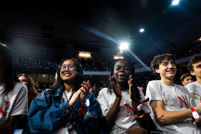 Students in the audience clapping at Convocation.