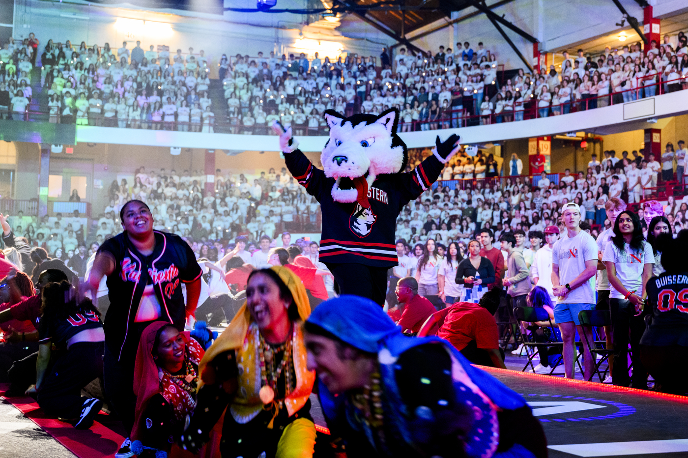 The Paws mascot on stage at convocation.