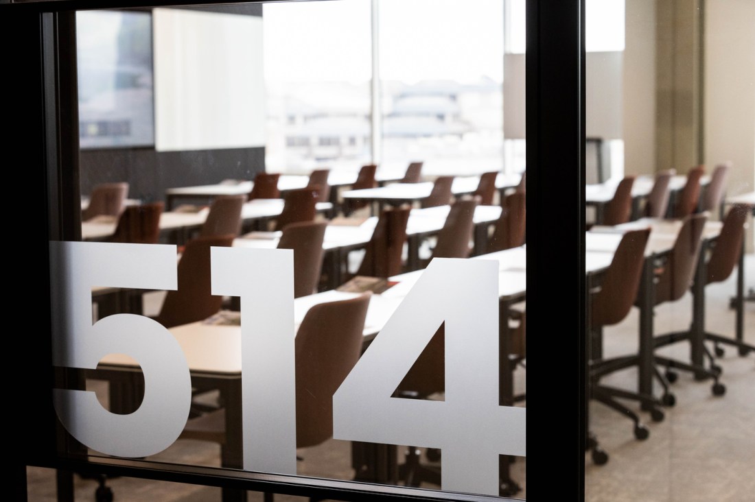 A decal of the numbers 514 on the glass window of a classroom in One Portsoken.