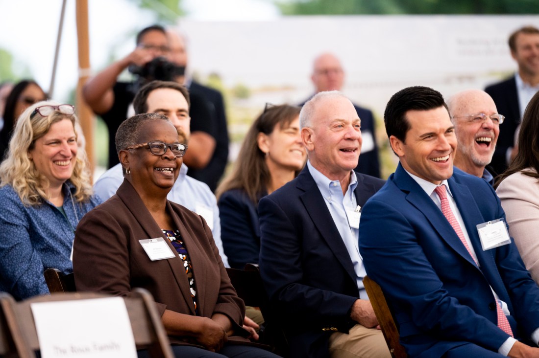 Audience members laughing at the Portland ground breaking.