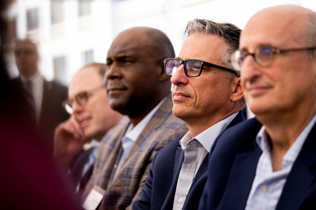 Audience members listening intently at the Portland ground breaking. 