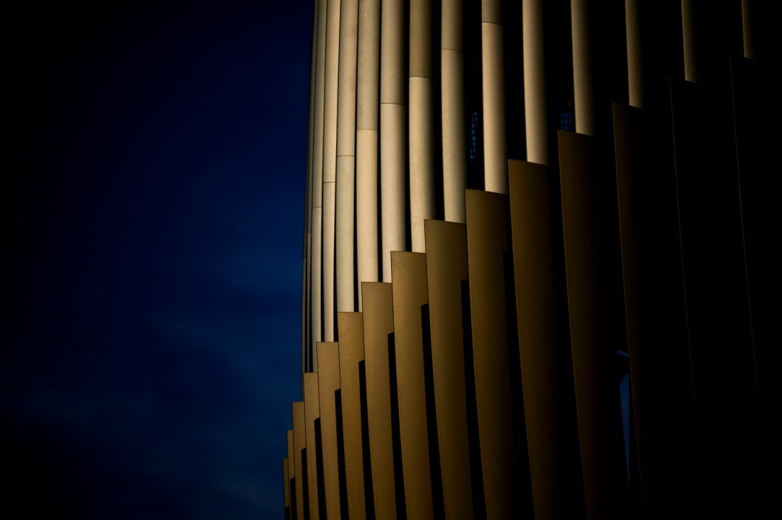 Close-up of a modern campus building's architectural features.