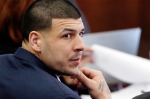 Aaron Hernandez looking over his shoulder while sitting in court.