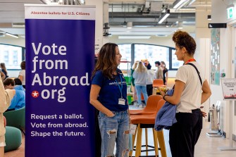 Students voting at a Vote From Abroad volunteer drive.