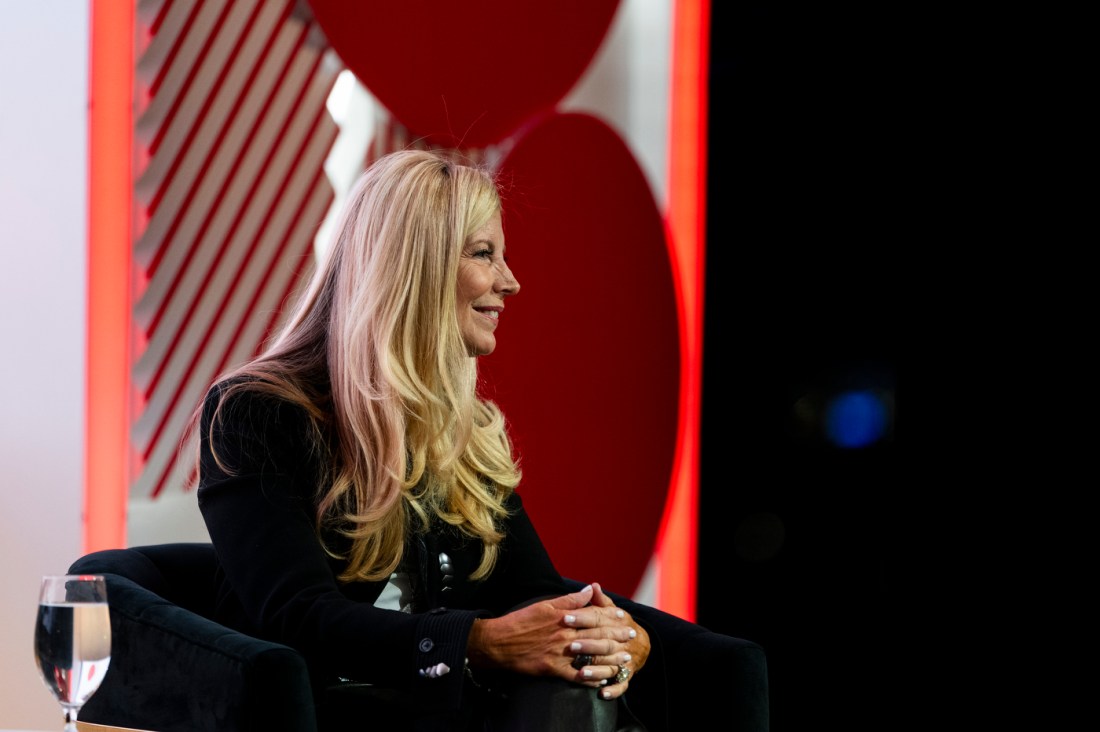 A person smiling at the Women Who Empower event.