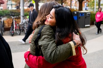 Vaishnavi Choukwale hugging another person.