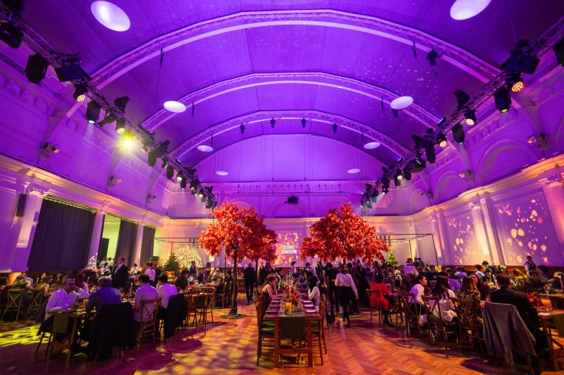 The beautifully lit and decorated Lindley Hall in London, set up for Northeastern’s Thanksgiving celebration.