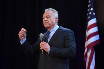 RFK Jr speaking into a microphone.