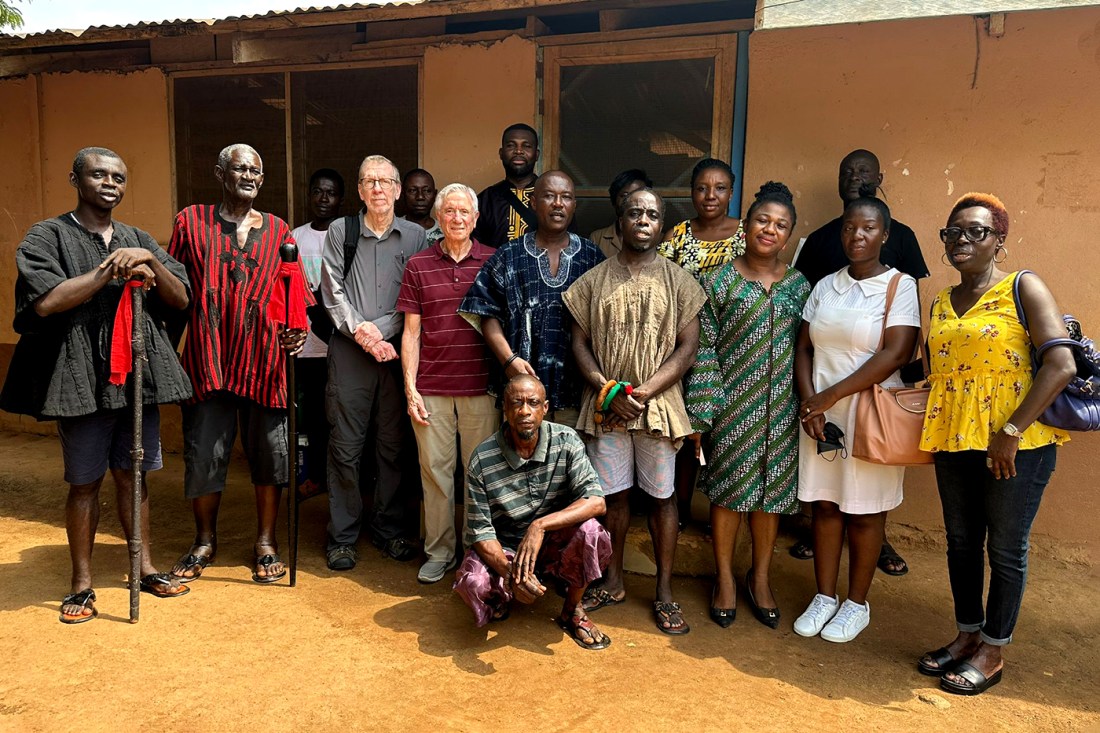 A group of people posing for a photo in Ghana.