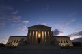 The U.S. Supreme Court building photographed at dusk.