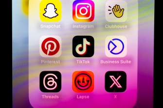 A screenshot of the TikTok app surrounded by other social media apps like Snapchat, Instagram, Pinterest, Threads, Lapse, and X.