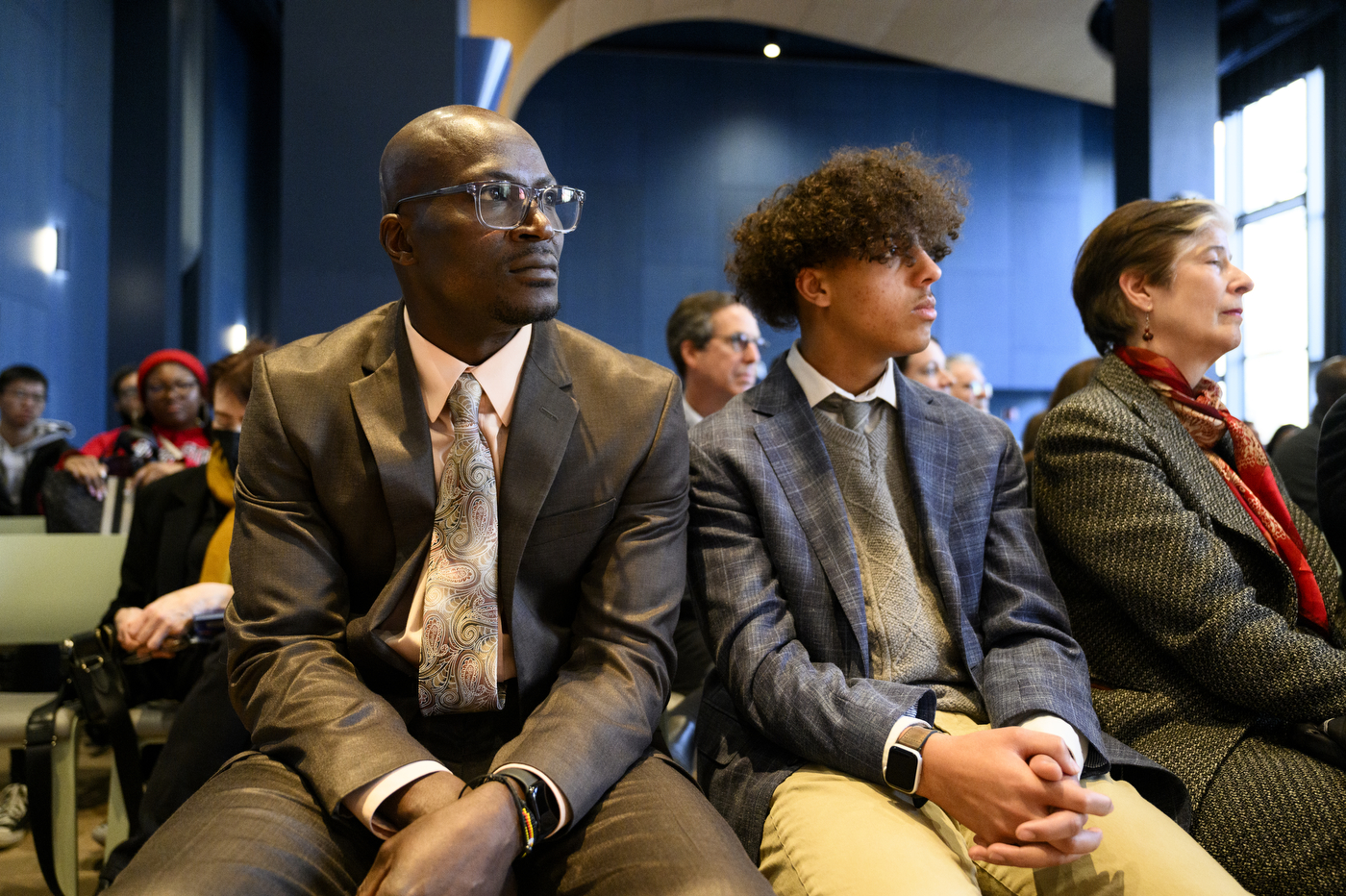 Audience members listening at the MLK Jr celebration event.